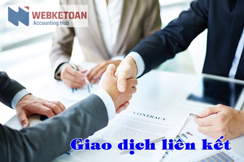Image of business partners handshaking over business objects on