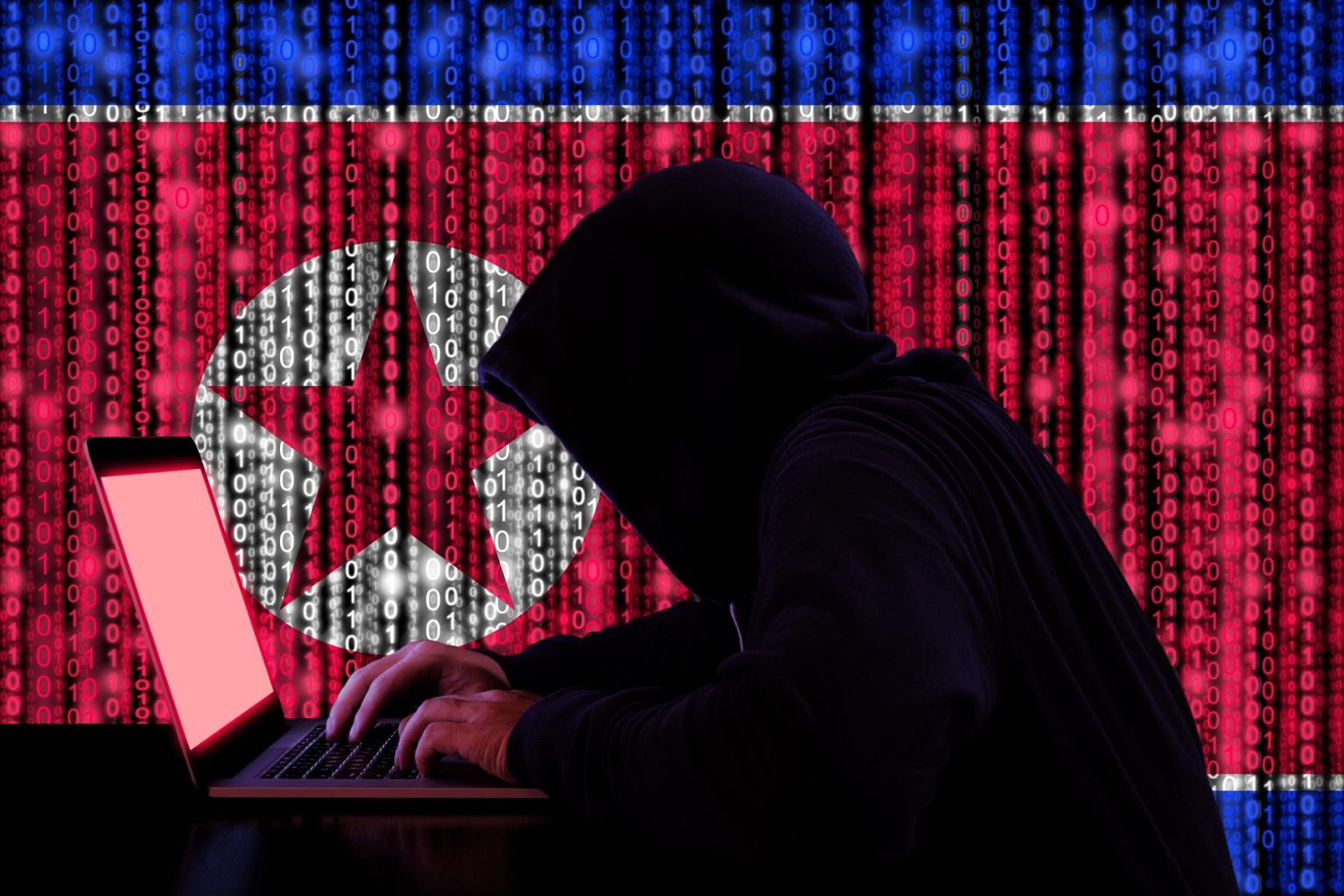 Hacker-with-computer-on-background-with-north-korea-flag-1536x1024